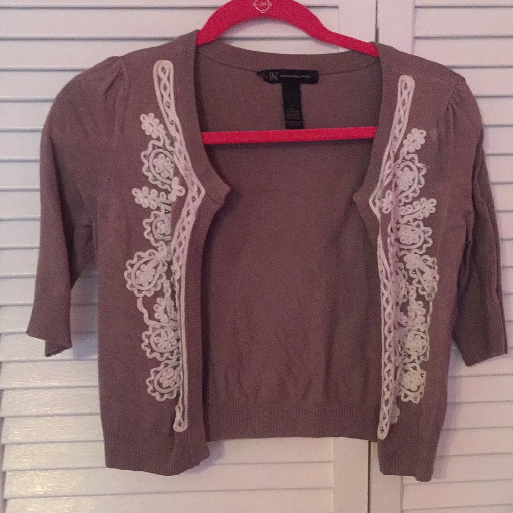 Sweater with white embroidery